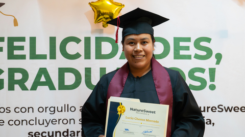 thumbnail A NatureSweet employee in Nayarit, MX, earns her diploma through the company's Adult Education program for employees. 