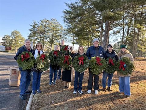 original Stryten Energy employees, family members, and friends in the community placed 1,000 wreaths at Green Lawn Cemetery & Mausoleum in Roswell, Ga.