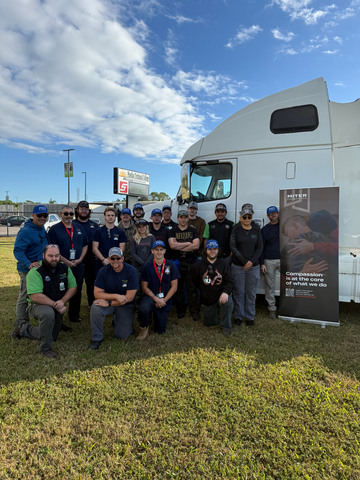 original Pinellas Technical College instructors and students pose with a decommissioned truck donated to the program by the MITER Foundation