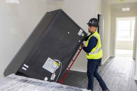 thumbnail GE Appliances installs a refrigerator that expands access to safe, fresh food storage. (Photo: GE Appliances, a Haier company)