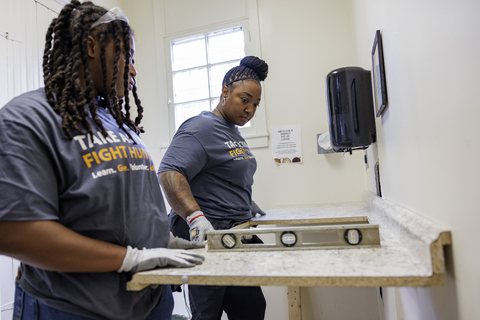 thumbnail GE Appliances employees measuring and leveling countertops during Hunger Action Month. (Photo: GE Appliances, a Haier company)