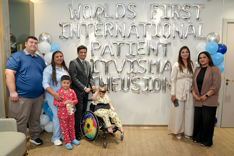 original World's first international patient, who received intrathecal gene therapy at Medcare Royal Hospital in Dubai, UAE, along with parents, and the hospital team. (Photo: AETOSWire)