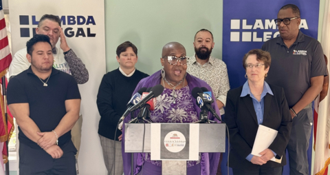 Dr. Toni Newman, Chair of Transcanwork, speaks as (left to right) Shane Stahl, Viscount Lucas Rojas, Stacy Dahl - LGBT Center, Dannie Cesena, Jenny Pizer and Shedrick Davis - Lambda Legal look on.