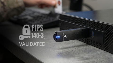 DataLocker Sentry 5 hardware-encrypted USB flash drive in use, featuring FIPS 140-3 Level 3 validation and smart card–based authentication to protect sensitive data in mission-critical environments.