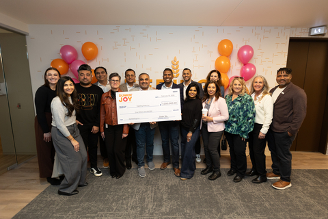 The Dunkin’® Joy in Childhood Foundation® announces a $1 million grant to Feeding America to help families facing food insecurity in communities nationwide. The funding will be distributed to local Feeding America partner food banks to support rising demand. Here, regional Dunkin' Franchisees and field team members celebrate with Feeding America leadership at the organization's Chicago headquarters.