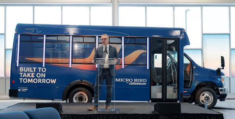 original Blue Bird signed an agreement to acquire Girardin Group’s stake in the 50/50 Micro Bird joint venture. Established in 2009, Micro Bird specializes in designing and manufacturing Type A school and commercial shuttle buses with capacities ranging from 9 to 36 passengers. Pictured here is John Wyskiel, president and CEO of Blue Bird Corporation, at the Sept. 2025 grand opening of the Micro Bird manufacturing facility in Plattsburgh, N.Y. (Image provided by Micro Bird)