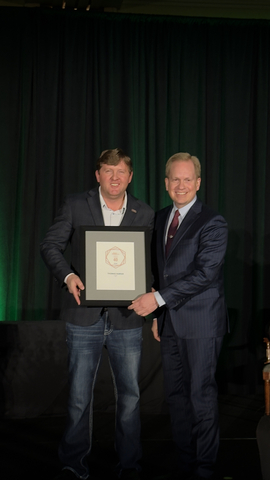 BZI's president, Thomas Harker accepts his award as one of the honorees in the Utah Business Forty Under 40 at a recent event sponsored by the media organization.