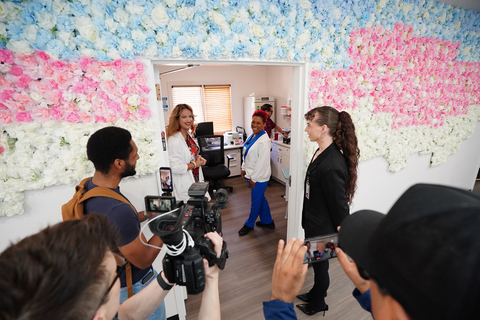 Razan Alawadhi, AHF Nurse Practitioner, Connie Norman Transgender Health Care Clinic (left, in doorway); shows the media a treatment room during a ribbon-cutting and opening ceremony of the Connie Norman Transgender Health Care Clinic in Los Angeles, California on Saturday, March 14, 2026. The addition of the Connie Norman Transgender Health Care Clinic, which can provide all needed health care services and HIV and STI Testing, will provide a safe and welcoming facility that is ‘Open For ALL’ at the Connie Norman Transgender Empowerment Center (CONOTEC). Jordan Strauss, AP for AIDS Healthcare Foundation (AHF).