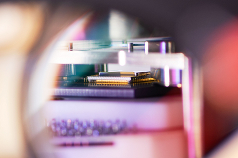 Ion trap, which uses electromagnetic fields to confine and control ions for use as quantum bits (qubits).