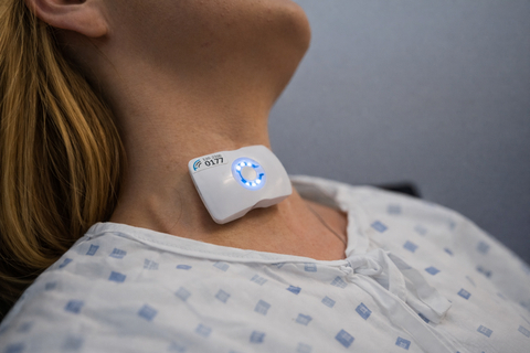 FloPatch, a wearable Doppler ultrasound device, is applied to the neck to measure real-time blood flow and help clinicians make faster, more personalized treatment decisions.