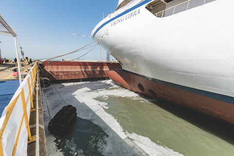 Water flows into the building dock at Fincantieri’s Ancona Shipyard during the float out ceremony for the Viking Libra.