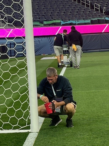 original A BrightView team member prepares a soccer pitch for international competition, supporting world-class playing conditions for events such as the FIFA World Cup.