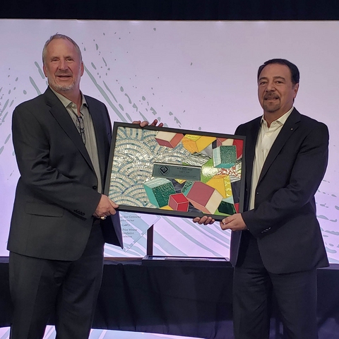 MAPEI North America's President and CEO Luigi Di Geso receives the Joe A. Tarver Award from NTCA's Executive Director Bart Bettiga at Coverings 2026.