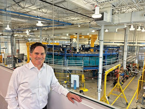 thumbnail Scott Gardner, President, Svante Development, stands at Svante's headquarters in Burnaby, BC, Canada, in front of the company's commercial-sized carbon capture machine, "Ursa 1000".