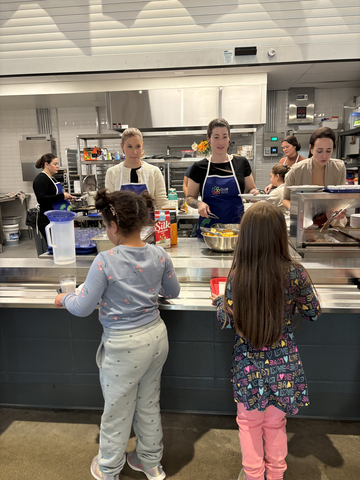 original Staff at Second Cup joined members of Breakfast Club of Canada in November 2025 at a school in Saint-Eustache, Quebec, where they served breakfast to students and presented a $40,000 donation in support of the Club’s programs. Photo: Foodtastic