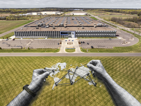 original French-Swiss artist Saype has completed a giant landscape painting on Graco’s campus in Dayton in honor of the global company’s 100th anniversary. In the piece, titled “By Our Hands,” two hands weave a fragile thread across the world, turning scattered possibilities into a single shared connection. Photo credit: Saype