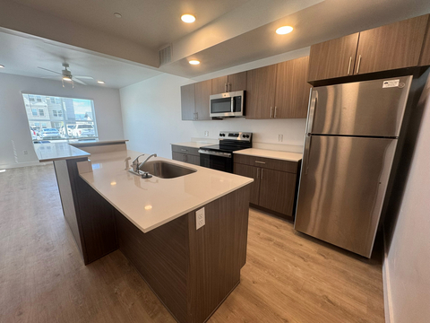 original A kitchen inside a newly constructed apartment home at Homestead Landing Apartments in Price, Utah. The 168-unit affordable housing community, developed by Hunt Capital Partners and CJM Development Group, offers two- and three-bedroom homes for households earning up to 60 percent of the Area Median Income.