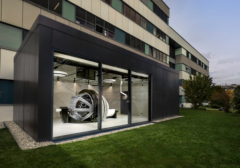 original Exterior view of the ZAP-X® Gyroscopic Radiosurgery® treatment suite at the European Radiosurgery Center Munich. As the first and only vault-free radiosurgery delivery system, ZAP-X enables an open, patient-centered treatment environment—moving beyond the traditional model of isolating patients within shielded radiation bunkers.