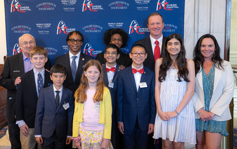 original U.S. Sen. Eric Schmitt, R-Mo., U.S. Rep. Wesley Bell, D-Mo., Rex Sinquefield, co-founder of the Saint Louis Chess Club, Katie Sinquefield and students from the Saint Louis Chess Club's Select Chess program pose for a photo following the Bipartisan Congressional Chess Tournament on Capitol Hill in Washington on June 3, 2026.
