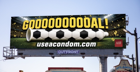 AHF's “GOOOOOOOOOAL!” billboard campaign, an imaginative new prevention initiative promoting condom use, is now running in six cities nationwide: Atlanta, Houston, Los Angeles, Miami, Philadelphia, and Seattle. The artwork roguishly plays off FIFA World Cup fever taking over the globe and the airwaves in anticipation of the 2026 tournament. The “GOOOOOOOOOAL!” artwork features imagery of the iconic black-and-white hexagonal skin of a soccer ball stretched lengthwise across a condom.