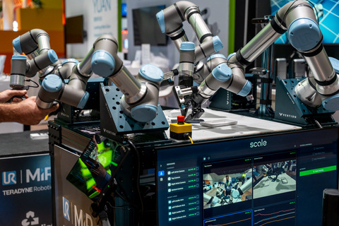original The UR AI Trainer, Universal Robots' imitation learning platform, allows users to physically guide UR robots through tasks like smartphone packaging, capturing high-fidelity, force-aware data to train sophisticated Vision-Language-Action (VLA) models for direct factory deployment.