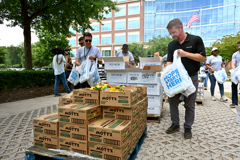 original Vontier employees pack over 10,000 pounds of food for distribution across the Triangle.