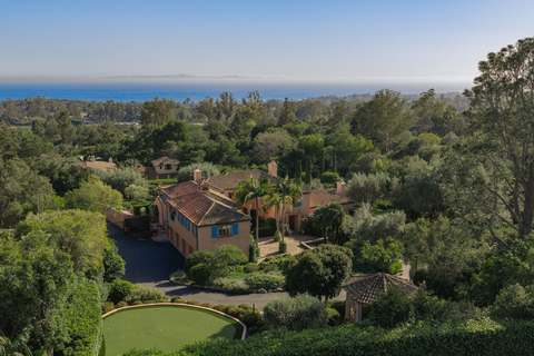 original Marsha Kotlyar of Berkshire Hathaway HomeServices California Properties offers one of Montecito’s last intact 1933 estate compounds for $18.5 million. Set on 3.41 acres in the prestigious Golden Quadrangle, the legacy property features a restored 6,000-square-foot main residence, two historic guest houses, and acclaimed gardens by landscape architect Sydney Baumgartner, offering a rare blend of architectural heritage, privacy, and ocean-view living. PHOTO CREDIT: Blake Bronstad