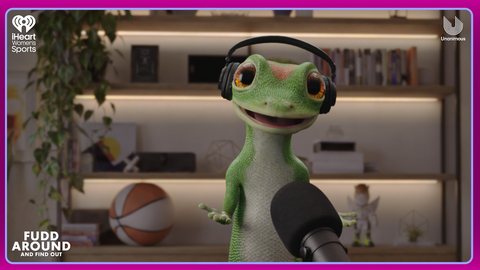 original For the first time, the GEICO Gecko is stepping into a live, unscripted conversation. Today, the brand character appears as a real-time, AI-powered participant on the iHeartMedia podcast “Fudd Around and Find Out,” hosted by Azzi Fudd.