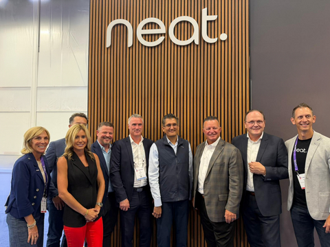 original Neat and Kinly teams meeting at the Neat booth during InfoComm 2026.