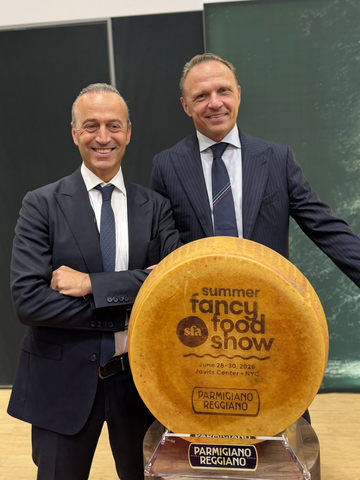 Consorzio del Parmigiano Reggiano President Nicola Bertinelli and Italy's Minister of Agriculture Francesco Lollobrigida (left to right) at this year's Summer Fancy Food Show