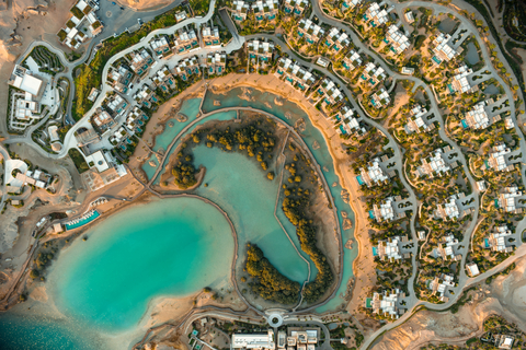 An aerial view of Six Senses AMAALA and its surrounding shoreline at Triple Bay