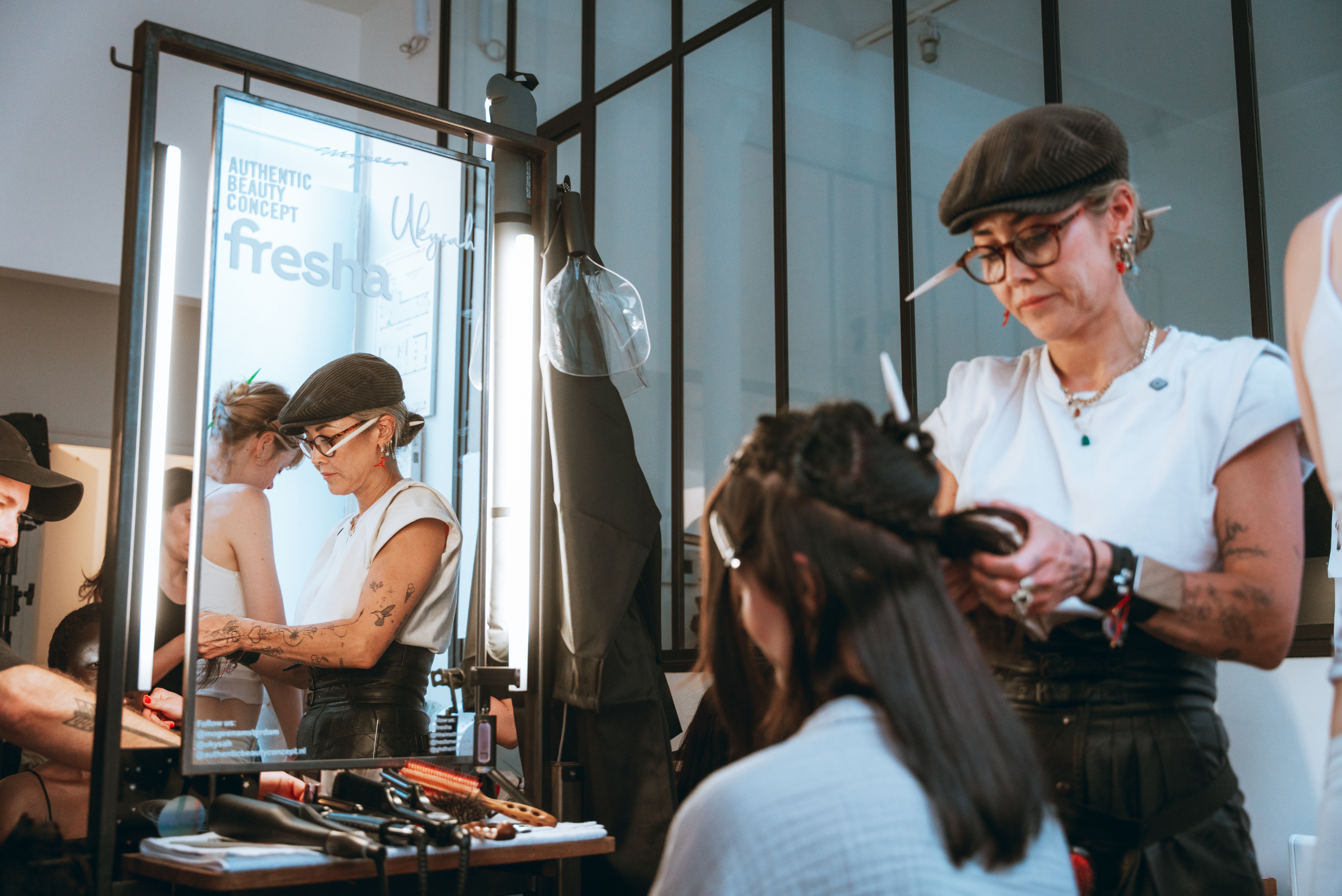Fresha Ambassador and renowned hairstylist Hester Wernert-Rijn styling hair backstage at Iris van Herpen’s Autumn/Winter 2026 Haute Couture show during Paris Haute Couture Week.