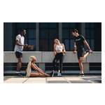 Group_of_runners_stretching_and_chatting_before_their_race.jpg