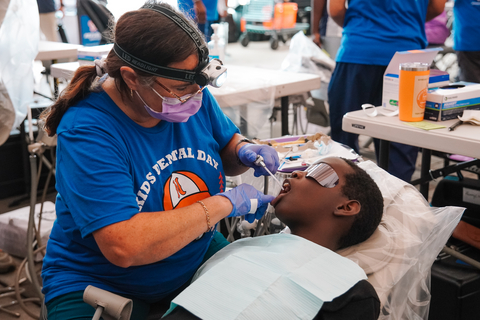 Delta Dental of Tennessee employee Gina Conrad keeps her dental hygienist license current to be able to volunteer at events just like Kids Dental Day.