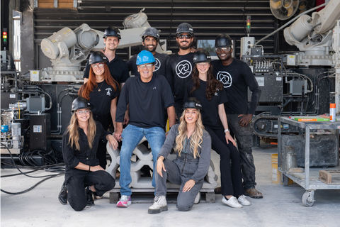 original Kind Designs Founder & CEO Anya Freeman with team members and investor Mark Cuban following the company's $10 million Pre-Series A funding round.