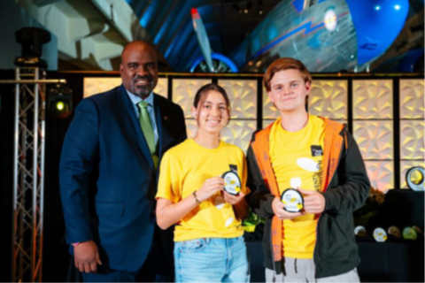 original Pablo Colón, Director of Corporate Citizenship and Executive Director of the Avangrid Foundation, presents students with Environmental and Sustainability Award