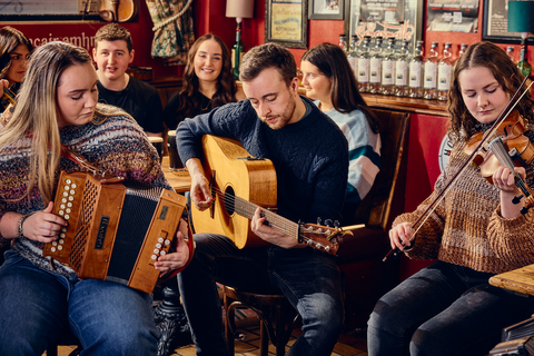 thumbnail Belfast Fleadh - Maddens Bar accordian, guitar and fiddle player (Chris Heaney)