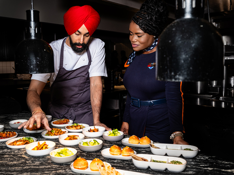 original Crown Shy's Executive Chef Jassimran Singh with JetBlue crewmember. Photo courtesy of JetBlue.