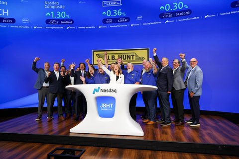 J.B. Hunt leaders and longtime employees mark the 65th anniversary of the company at a Nasdaq Opening Bell ceremony in New York City. The group included drivers, maintenance technicians, office employees and executives whose service spans multiple decades of the company's history.