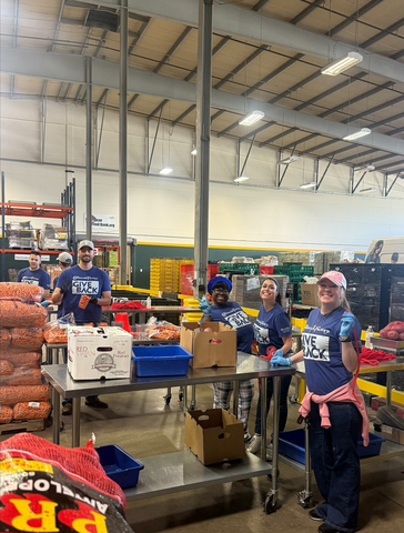 original The Cheesecake Factory staff members from Roseville, CA volunteer at a Give Back program event at their local food bank