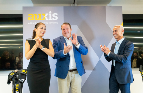 original Auxis team celebrates the opening of their Bogota office.