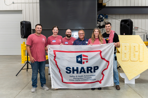 BCI Cedar Falls team members and local officials display the facility’s Safety and Health Achievement Recognition Program (SHARP) banner during the recognition celebration. From left: Nic Poshusta, Region Sales Manager, BCI; Jamie Klingman, Creative and Client Services Manager, BCI; Andrew Ogden, General Manager, BCI; Gil Schultz, Cedar Falls City Council member; Megan Gently, Sales Manager, BCI; and Danny Laudick, Mayor of Cedar Falls