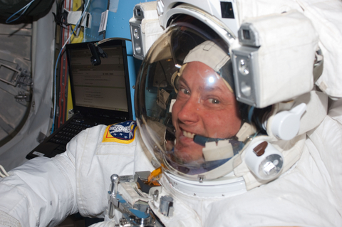 NASA astronaut Mike Fincke is pictured inside the International Space Station’s Quest airlock prior to the start of the third spacewalk for the STS-134 mission. Credit: NASA