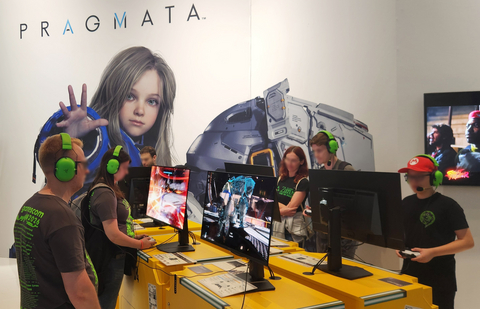 Visitors experiencing PRAGMATA on gaming monitors featuring Samsung Display’s QD-OLED at the CAPCOM booth during gamescom 2026