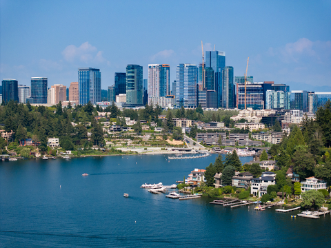 original Bellevue’s downtown skyline rises above Lake Washington, where urban experiences, waterfront recreation, and Pacific Northwest nature come together.