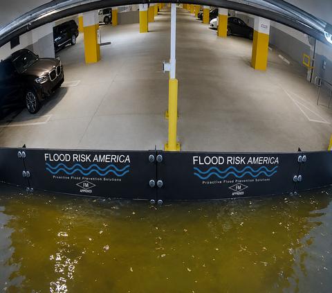 original The FRA Flood Panel holding strong to protect a parking garage from flooding