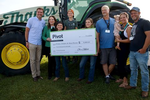 original Pivot Bio CEO Chris Abbott and USDA Secretary of Agriculture Brooke Rollins with the Fenner family.