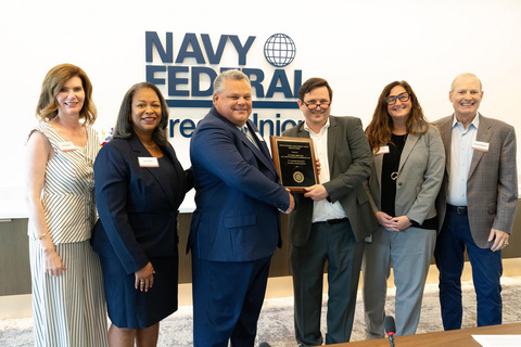 original Kara Cardona and Dietrich Kuhlmann present the DON Credit Union of the Year Award to Navy Federal's Joint Expeditionary Base Little Creek-Fort Story Branch in recognition of its exemplary service to military members and their families.