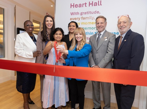 Actress Melissa Rauch cuts the red ribbon at opening of Ronald McDonald House New York's new Community Floor, alongside President & CEO Lucretia Gilbert, Board Chair Steven J. Bensinger, Board member, Shelly Friedman, and Chief Operations & Management Officer Wini Cudjoe, and RMH-NY family Jaleyah (child) and Theresa (mother), during Childhood Cancer Awareness Month. The ceremony, held at the House on East 73rd Street, New York, on September 15, 2026, celebrates a long-awaited renovation to enhance the experience of families staying at Ronald McDonald House New York while their children receive treatment for cancer and other serious illnesses. (Photo by Kevin Dale Photography)