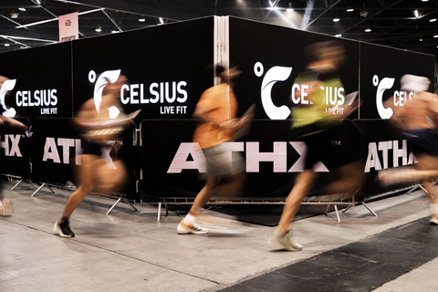 Athletes compete at the recent ATHX Games in Marseille, France, racing past CELSIUS® and ATHX-branded signage on the competition floor.